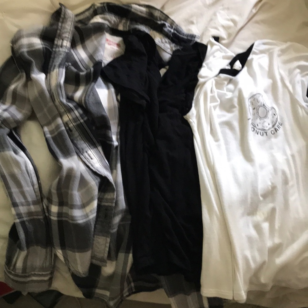 flannel, i donut care white shirt and black shirt